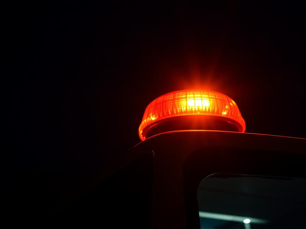 Amber beacons — visible at the roadside.